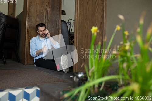 Image of Restaurant, cafe, bar closed due to COVID-19 or Coronavirus outbreak lockdown, stressed owner of small business trying to find solution