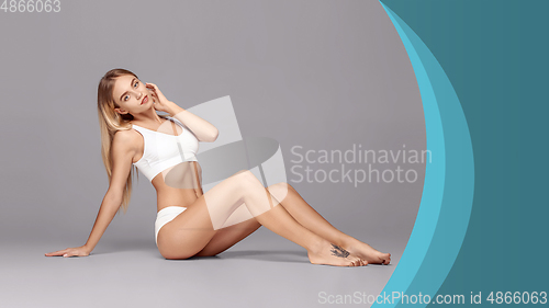 Image of Beautiful woman in underwear, design. Beauty, cosmetics, spa, depilation, treatment and fitness concept, sensual posing, flyer