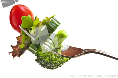 Image of Fresh vegetables on a fork