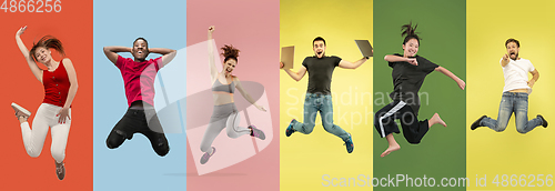 Image of Young emotional people jumping high, look happy and cheerful on multicolored background