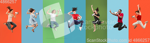 Image of Young emotional people jumping high, shouting with speaker on multicolored background