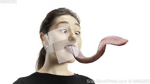 Image of Smiling girl opening her mouth and showing the long big giant tongue isolated on white background, crazy and attracted