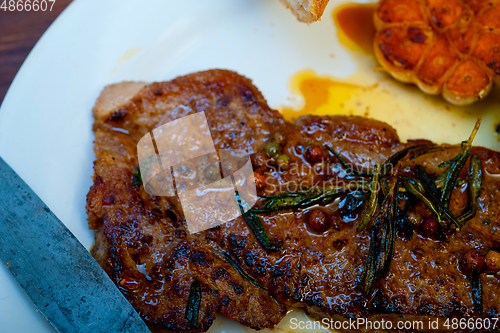 Image of roasted grilled ribeye beef steak butcher selection