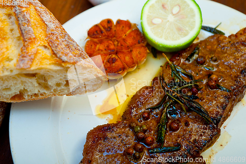 Image of roasted grilled ribeye beef steak butcher selection