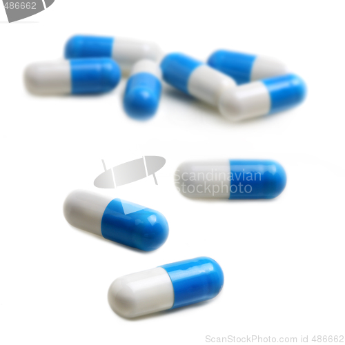 Image of blue & white capsules