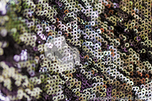 Image of shimmering fabric with sequins background