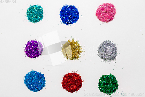 Image of set of glitters on white background