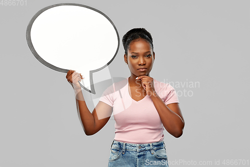 Image of african american woman holding speech bubble