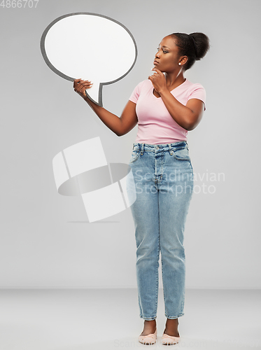 Image of african american woman holding speech bubble