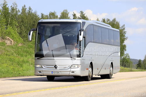Image of Silver Mercedes-Benz Turismo Coach Bus on Road