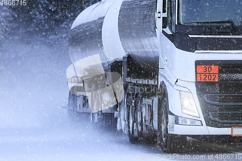 Image of Tanker Truck Hauls Diesel Fuel in Snowfall, Detail