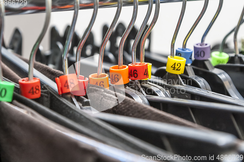 Image of Hangers in a Clothes Shop