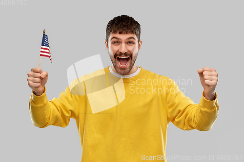Image of happy laughing man with flag of america
