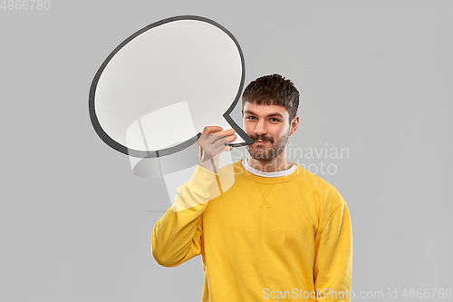 Image of happy man with speech bubble over grey background