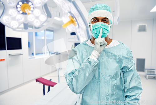 Image of indian male doctor or surgeon over operating room