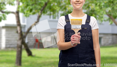 Image of close up of painter or builder with paint brush