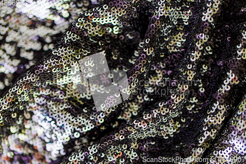 Image of shimmering fabric with sequins background