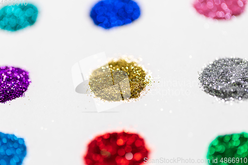 Image of set of glitters on white background