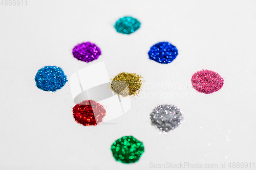 Image of set of glitters on white background