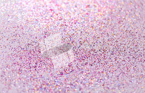 Image of multicolored glitters on white background