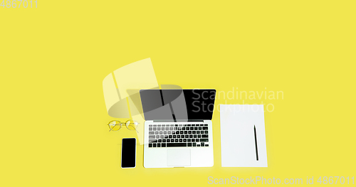 Image of Gadgets, devices on top view, blank screen with copyspace, minimalistic style, flyer