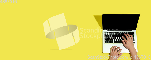 Image of Hand using gadgets, device on top view, blank screen with copyspace, minimalistic style, flyer