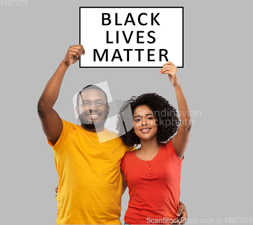 Image of african couple with black lives matter banner