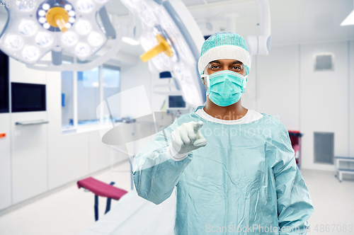 Image of indian male doctor or surgeon over operating room