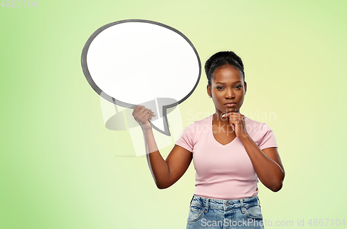 Image of african american woman holding speech bubble