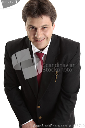 Image of Businessman looking up smiling