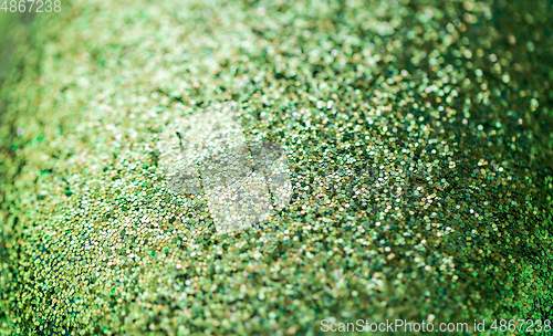 Image of green glitters or sequins background