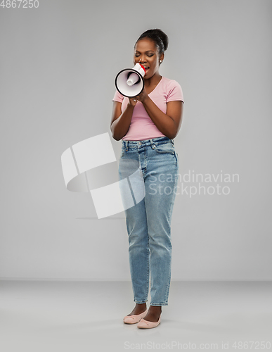 Image of african american woman over grey background