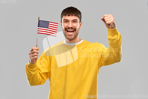 Image of happy laughing man with flag of america