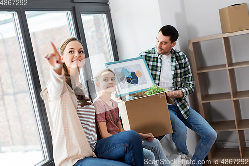 Image of happy family with child moving to new home