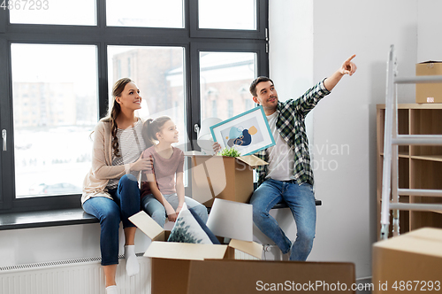 Image of happy family with child moving to new home