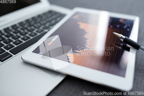 Image of Digital stock market chart on a tablet screen