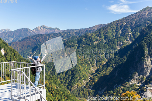 Image of Woman enjoy travel to tateyama mountain range