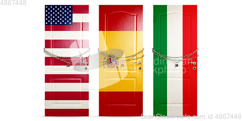 Image of Door colored in USA, Spain, Italy flags, locking with chain. Countries lockdown during coronavirus, COVID spreading