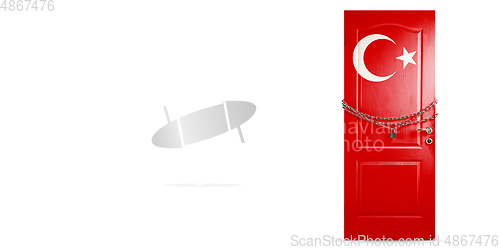 Image of Door colored in Turkey flag, locking with chain. Countries lockdown during coronavirus, COVID spreading
