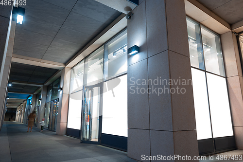 Image of Blank citylight for advertising on the building at city night, copyspace for your text, image, design