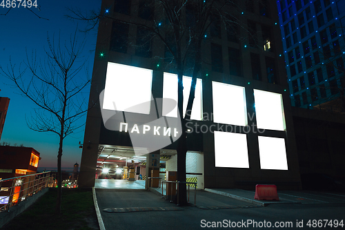 Image of Blank citylight for advertising on the building at city night, copyspace for your text, image, design