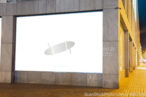 Image of Blank citylight for advertising on the building at city night, copyspace for your text, image, design