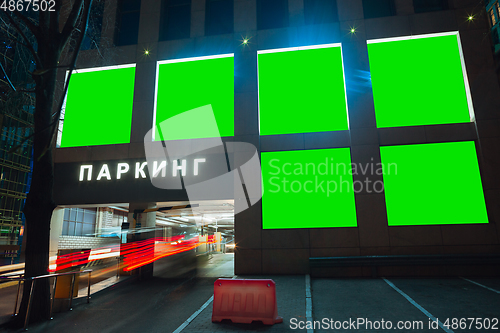 Image of Blank citylight for advertising on the building at city night, copyspace for your text, image, design