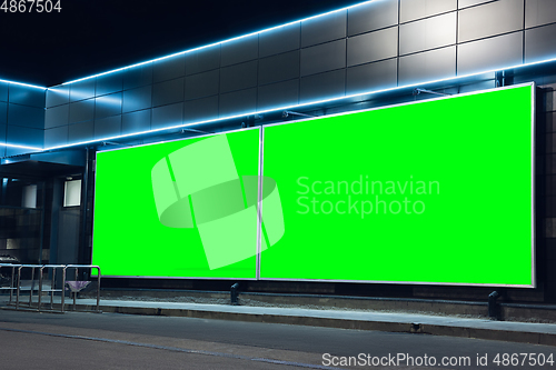 Image of Blank citylight for advertising on the building at city night, copyspace for your text, image, design