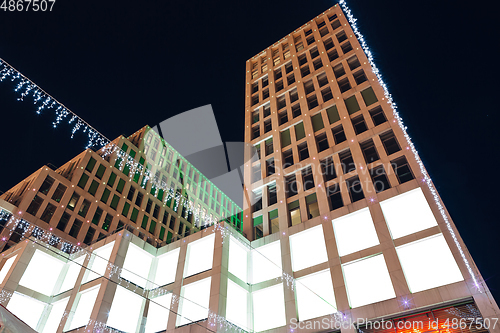 Image of Blank citylight for advertising on the building at city night, copyspace for your text, image, design