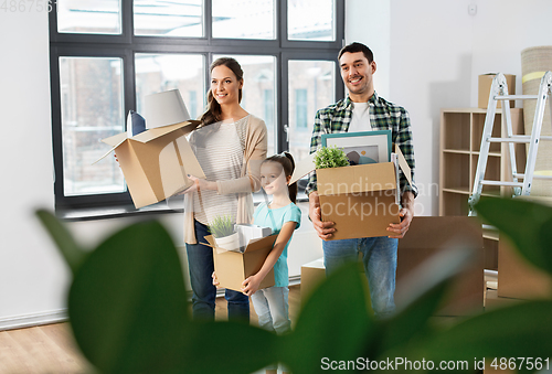 Image of happy family with child moving to new home