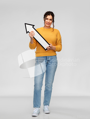 Image of smiling young woman with big white upward arrow