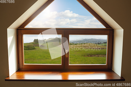 Image of Closed window and beautiful picture outside, nature view, resort and resting