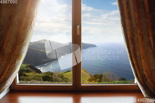 Image of Closed window and beautiful picture outside, nature view, resort and resting