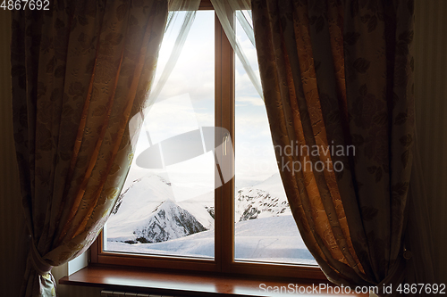 Image of Closed window and beautiful picture outside, nature view, resort and resting